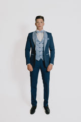 Abito blu con Reverse  e gilet damascato celeste